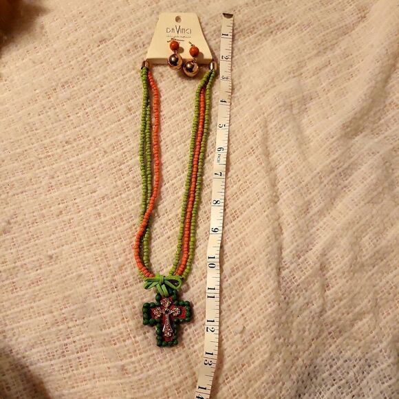 A beaded necklace  with a cross attached with leather Swarovski blue crystal - Picture 4 of 5